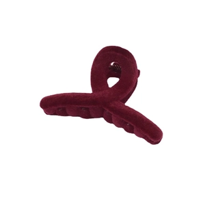 Elegant dark red velvet hair clip with a stylish twisted knot design for women