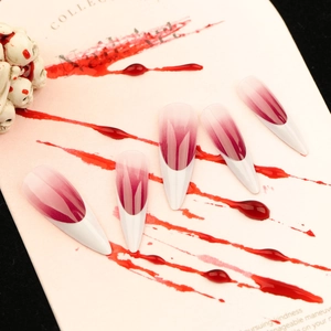 Long stiletto press on nails with red and white ombre gradient for Halloween