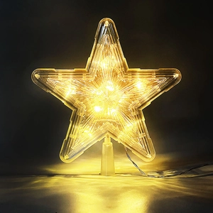 Luminous star-shaped Christmas tree topper with warm LED lights in transparent plastic