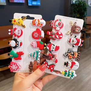 10-piece Christmas hair clip set with Santa, reindeer and tree shapes on metal clips