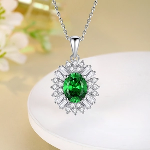 S925 sterling silver necklace with emerald-green gemstone in a radiant halo setting