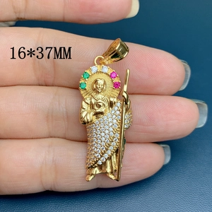 Macro view of St. Jude religious pendant with zircon stones measuring 16x37mm