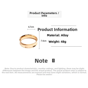 Polished gold geometric bangle detail with dimensions 6.7cm diameter and 7.4cm height