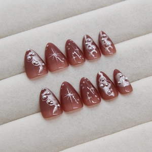 Gothic star press-on nails in rose cat-eye gradient with pearls and silver accents