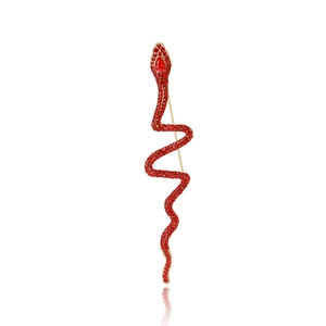 Luxury red snake-shaped brooch with crystals and gold finish on a white background