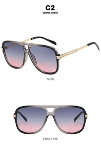 Detail of square double bridge sunglasses with gradient blue lenses and gold metal temples