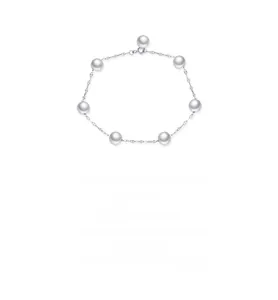Detailed macro view of S925 silver bracelet featuring seven elegant white pearls
