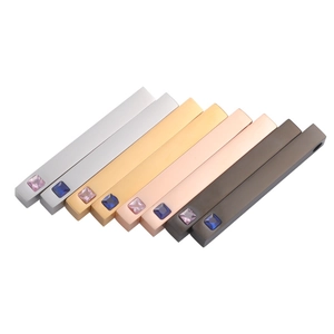 Mirror polished stainless steel bar pendants with inset gems in four metallic finishes