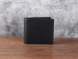 Close-up of black crazy horse leather men's wallet showing premium texture and stitching