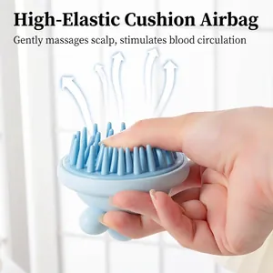 Light blue silicone scalp massage brush with high elastic air cushion and soft bristles