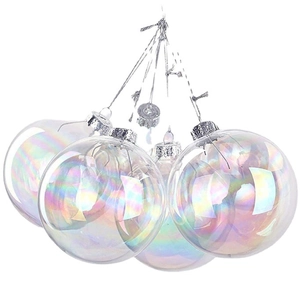 Iridescent transparent Christmas ornaments hanging as a set of 5 on white background