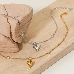 Elegant heart pendant anklets in gold and silver finish with sparkling zircon stones