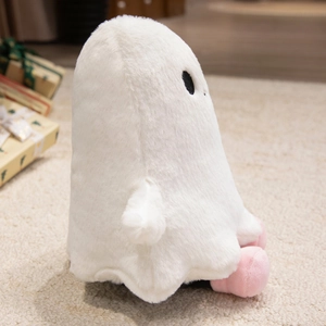 Close-up of white ghost plush toy with soft fur, pink feet, and black embroidered eyes