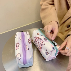 Detail showing smooth zipper closure on cute cartoon canvas stationery storage bag