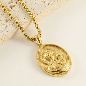 Detailed close-up of a 3D religious relief oval pendant on a gold box chain necklace