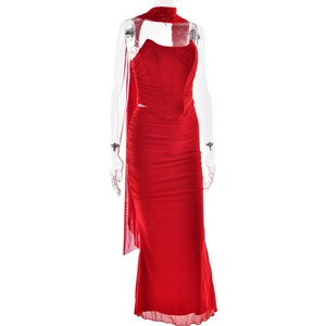 Close-up of red ruched bodycon maxi dress with matching neck scarf detail on a mannequin
