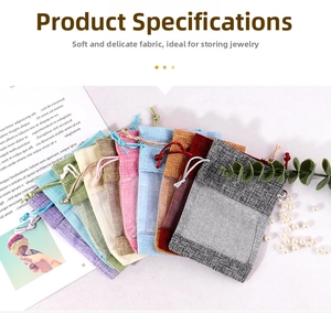 Macro detail of linen jewelry pouches with drawstring and transparent mesh window view