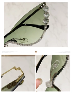 Macro detail of cat-eye sunglasses with rhinestone edges and metal hinges on marble