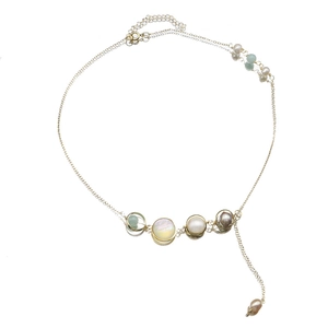 Natural freshwater pearl necklace with light green gemstones and gold chain finish