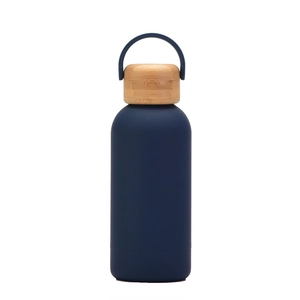 Close-up of matte dark blue vacuum bottle with bamboo texture lid and portable handle