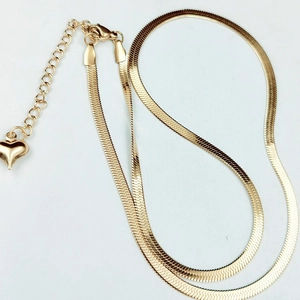 Elegant gold flat snake chain necklace with heart pendant and adjustable lobster clasp