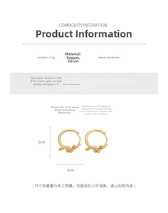 Close-up of 18k gold plated knot hoop earrings with cubic zirconia and 2cm diameter