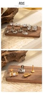 Detailed close-up of titanium stud jewelry set with 520 and 1314 numeric designs