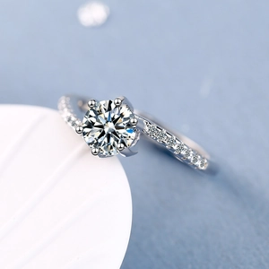Elegant silver wide band ring with round zircon center stone and side row diamonds