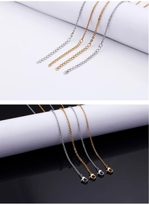 Detail of 2mm stainless steel O-chains in gold and silver with lobster clasps