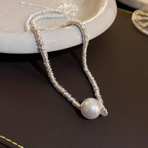Minimalist silver wire geometric choker necklace with a round white pearl pendant charm