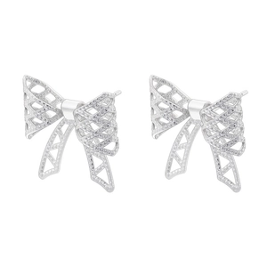 Detailed close-up of silver bow stud earrings with intricate hollow-out texture