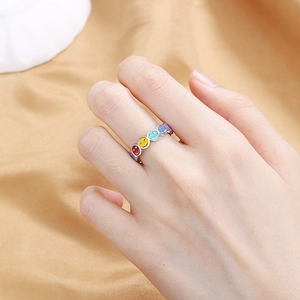 Colorful enamel smiley face ring in silver stainless steel worn on finger