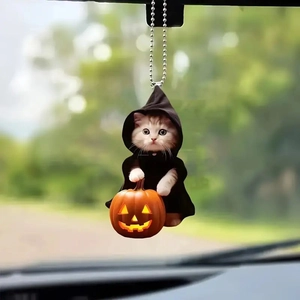 Acrylic cat with black cloak holding a glowing pumpkin car mirror hanging accessory