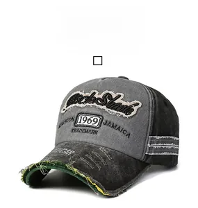 Detail of Rock Shark 1969 embroidery on vintage distressed gray and black baseball cap