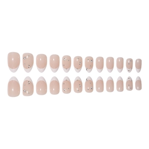 French style press-on nails set with star and moon patterns on nude pink base