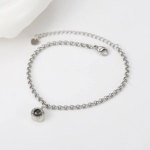 Silver projection bracelet for couples with round stone and cubic zirconia inlay