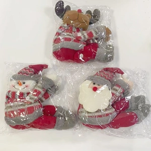 Three-piece Christmas plush doll set featuring elk, snowman, and Santa in clear packaging