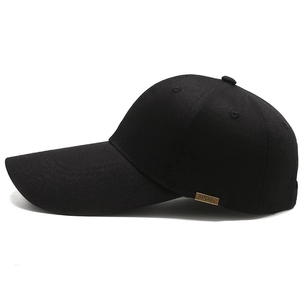 Classic black baseball cap with extended brim and gold metal SPORT logo detail
