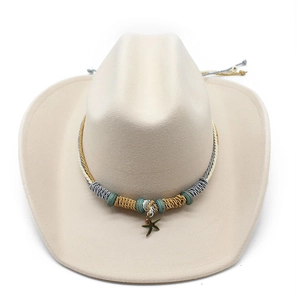Detail of woven hat band with turquoise beads and starfish pendant on wool fedora