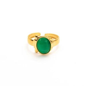 Detail of adjustable gold ring featuring an oval green cat-eye gemstone inlay