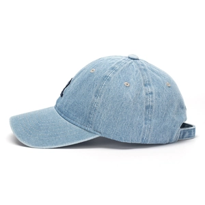Side view of light blue washed denim baseball cap with navy blue R letter embroidery