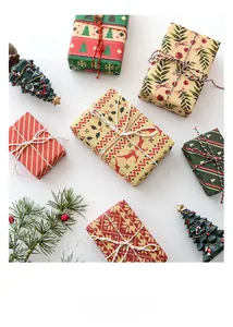 Detailed view of Christmas gift wrapping paper with reindeer and snowflake patterns