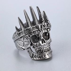 Close-up of gothic crown skull ring with vintage silver finish and detailed relief