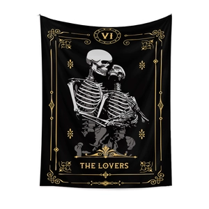 Bohemian tarot style wall tapestry featuring skull lovers and golden floral border