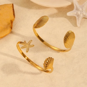 18k gold starfish and shell open bangle in stainless steel for beach vacations