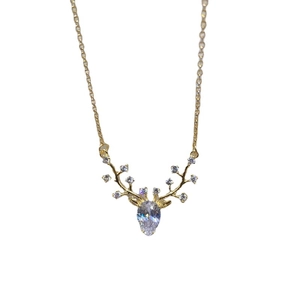 Golden reindeer necklace with zircon antlers and pear-shaped drop stone pendant