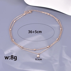 Double-layered 18K rose gold stainless steel necklace with beads and zircon pendant