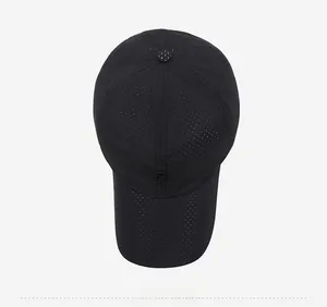 Top view of black quick-dry mesh baseball cap with breathable laser-cut holes and logo