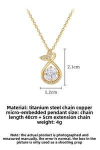 Detail view of fishtail drop pendant necklace with size markings and 40cm chain