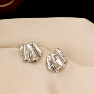 Minimalist silver irregular geometric crumpled earrings with high polish metallic finish